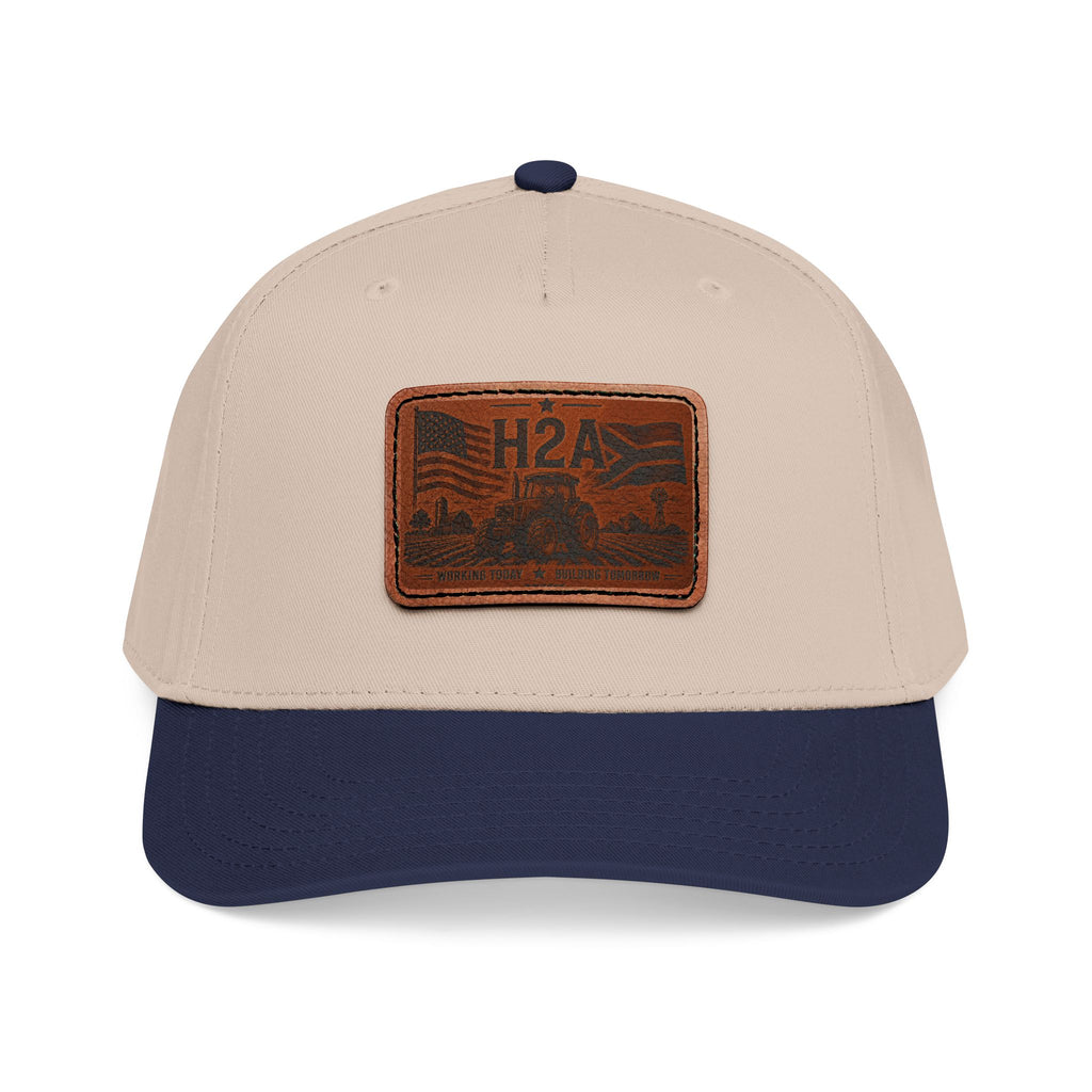 Leather patch baseball cap, beige crown with dark navy brim and rectangle H2A patch