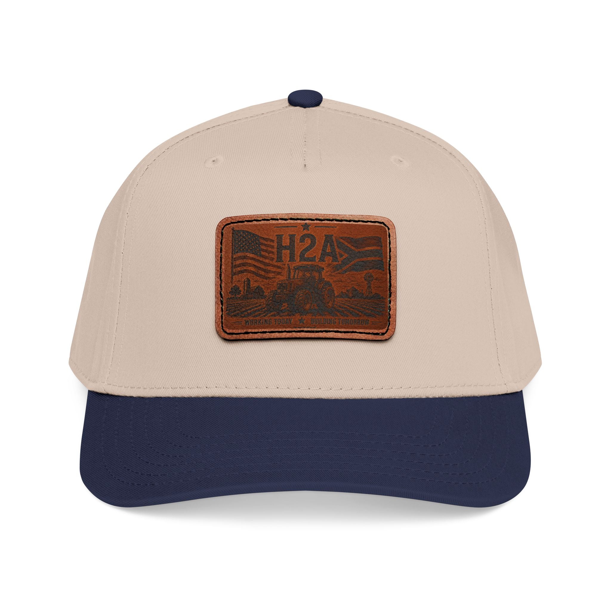 Leather patch baseball cap, beige crown with dark navy brim and centered rectangle H2A patch