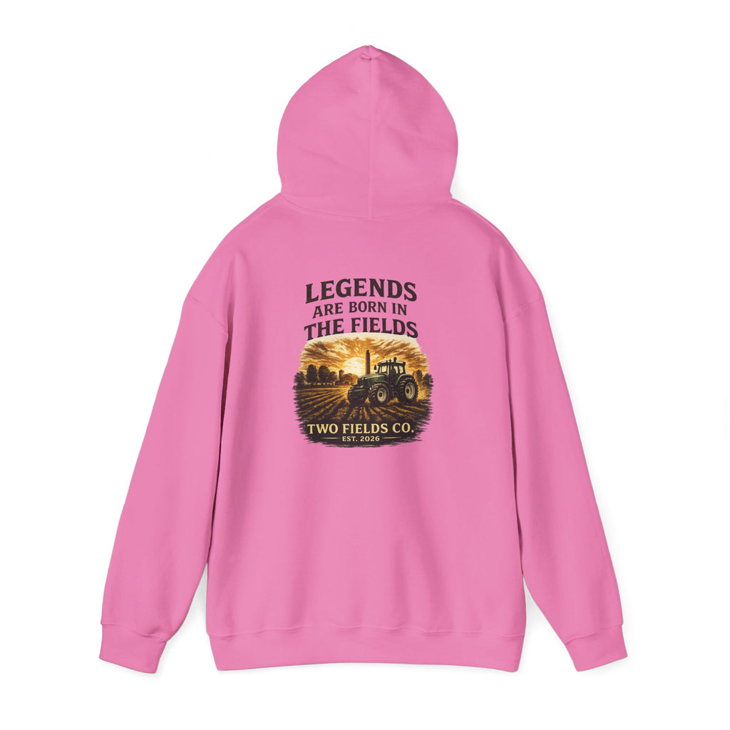 Pink hooded pullover sweatshirt with large tractor graphic and slogan on back