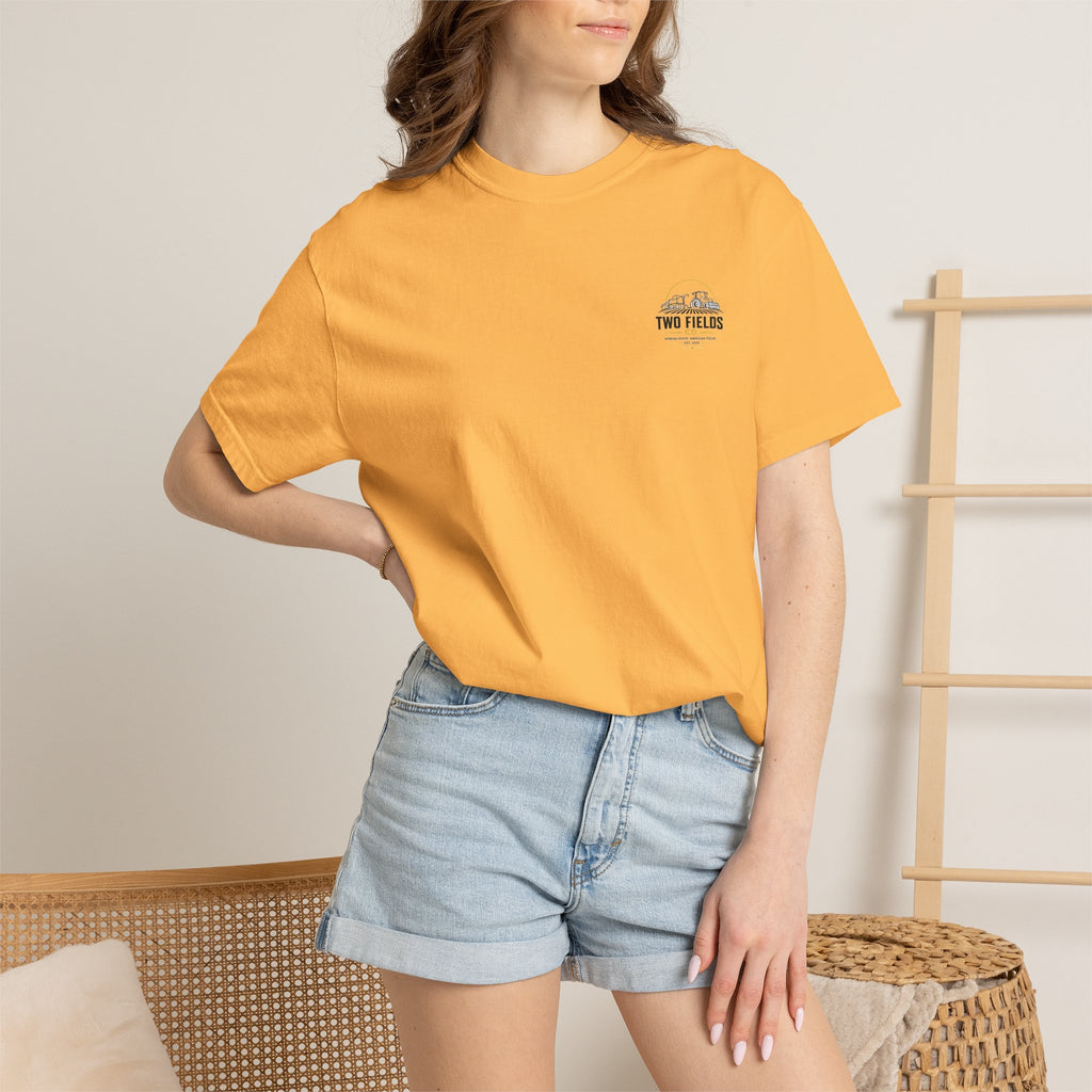 Mustard orange farm t-shirt with small Two Fields logo at left chest