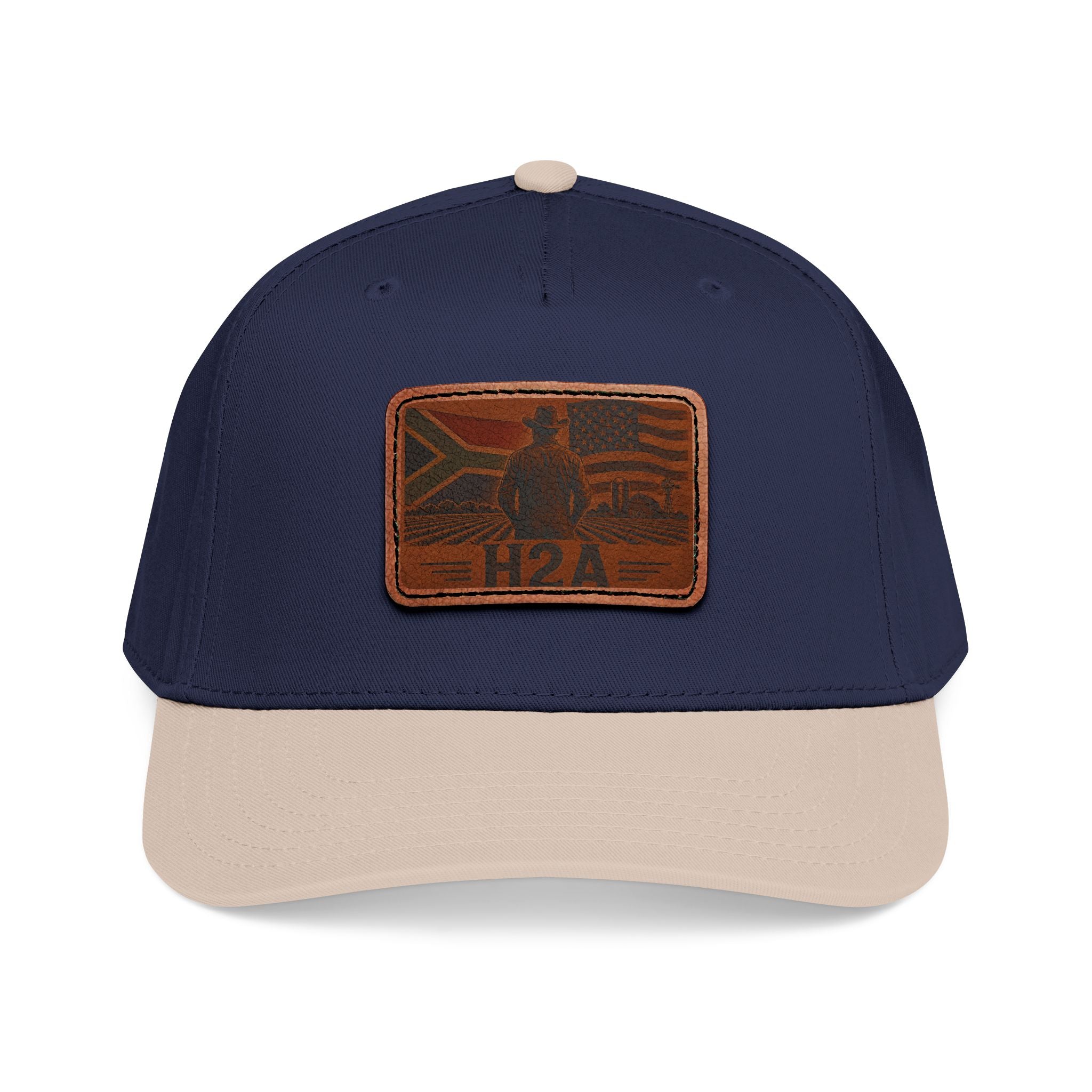 Leather patch baseball cap in dark navy with cream brim and rectangular H2A logo patch