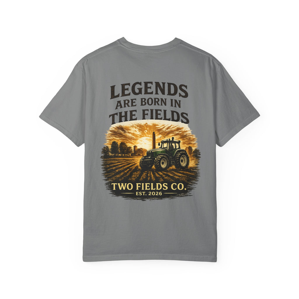 Dark gray front graphic farm tractor T-shirt with 'Legends Are Born in the Fields' print.