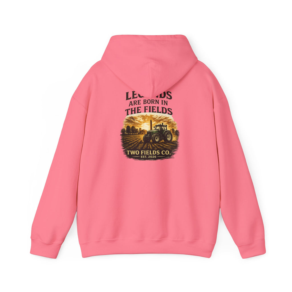 Pink hooded pullover sweatshirt with tractor graphic and slogan on back