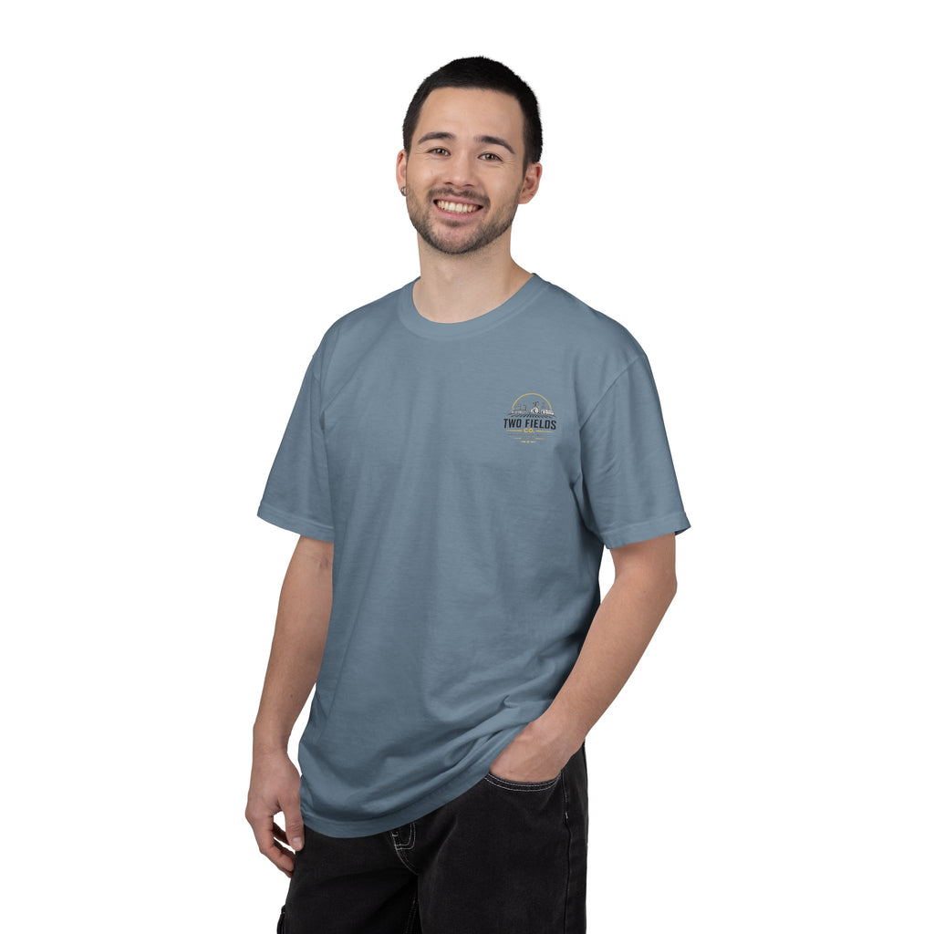 Heather blue crew-neck T-shirt on model with small chest logo emblem