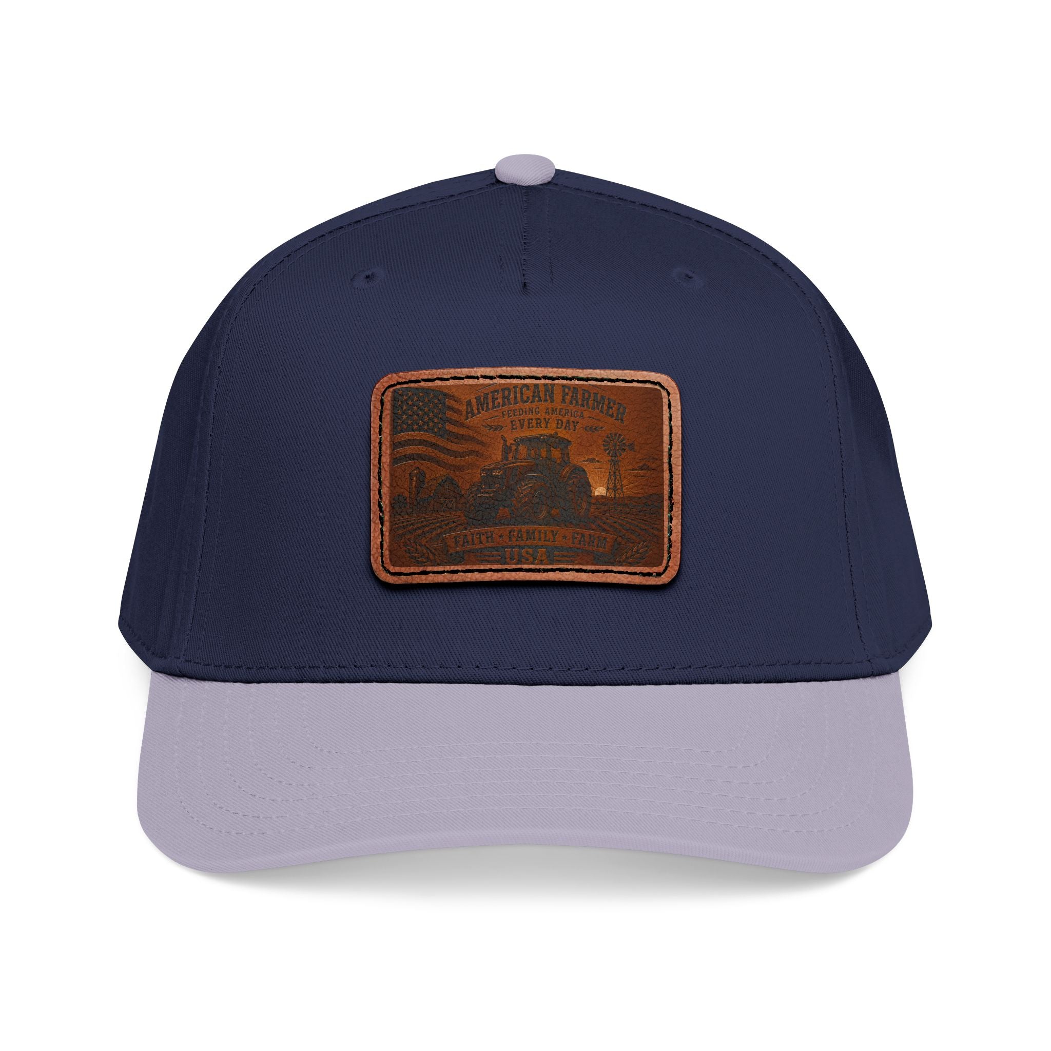 Baseball cap in dark navy and light gray with rectangular leather patch on front