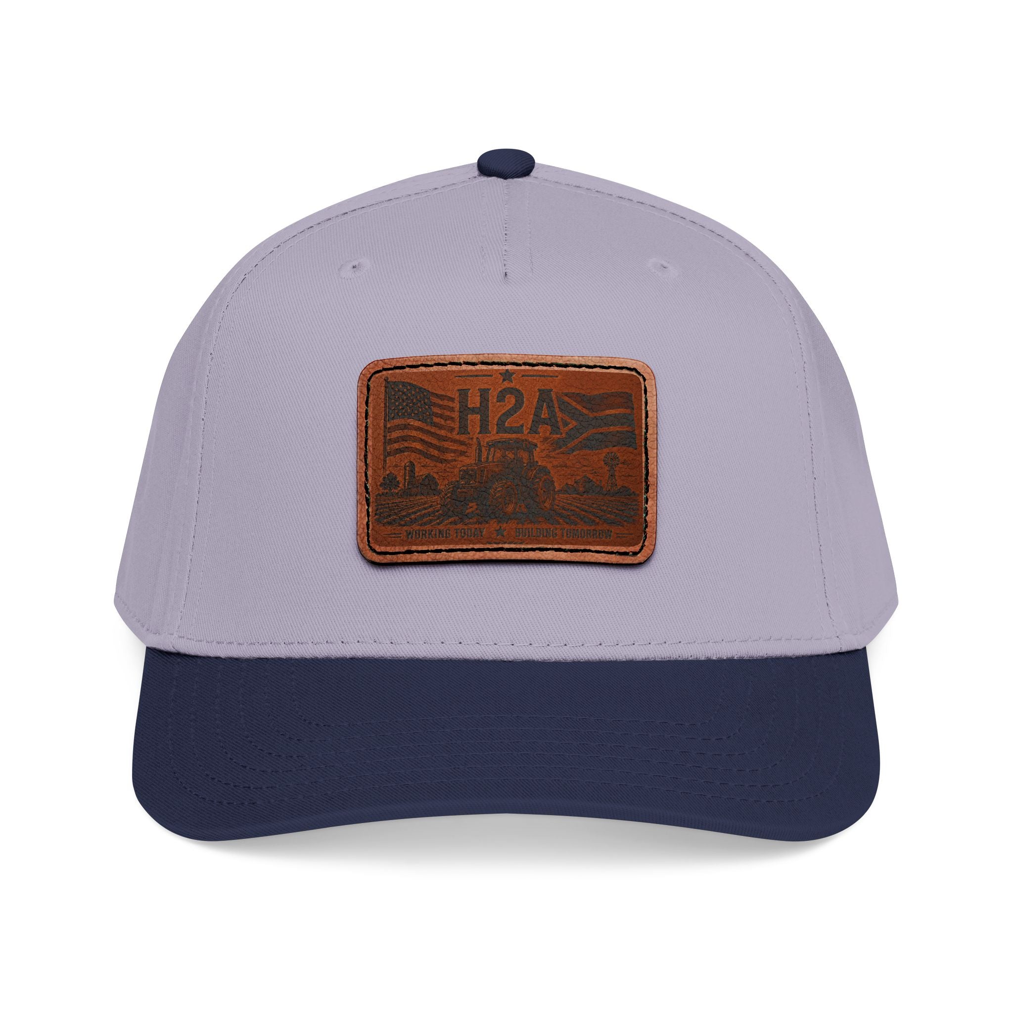 Two-tone baseball cap with rectangle H2A leather patch; light gray crown and dark navy brim.