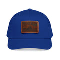 Baseball cap with royal blue crown and light brown rectangle leather logo patch.
