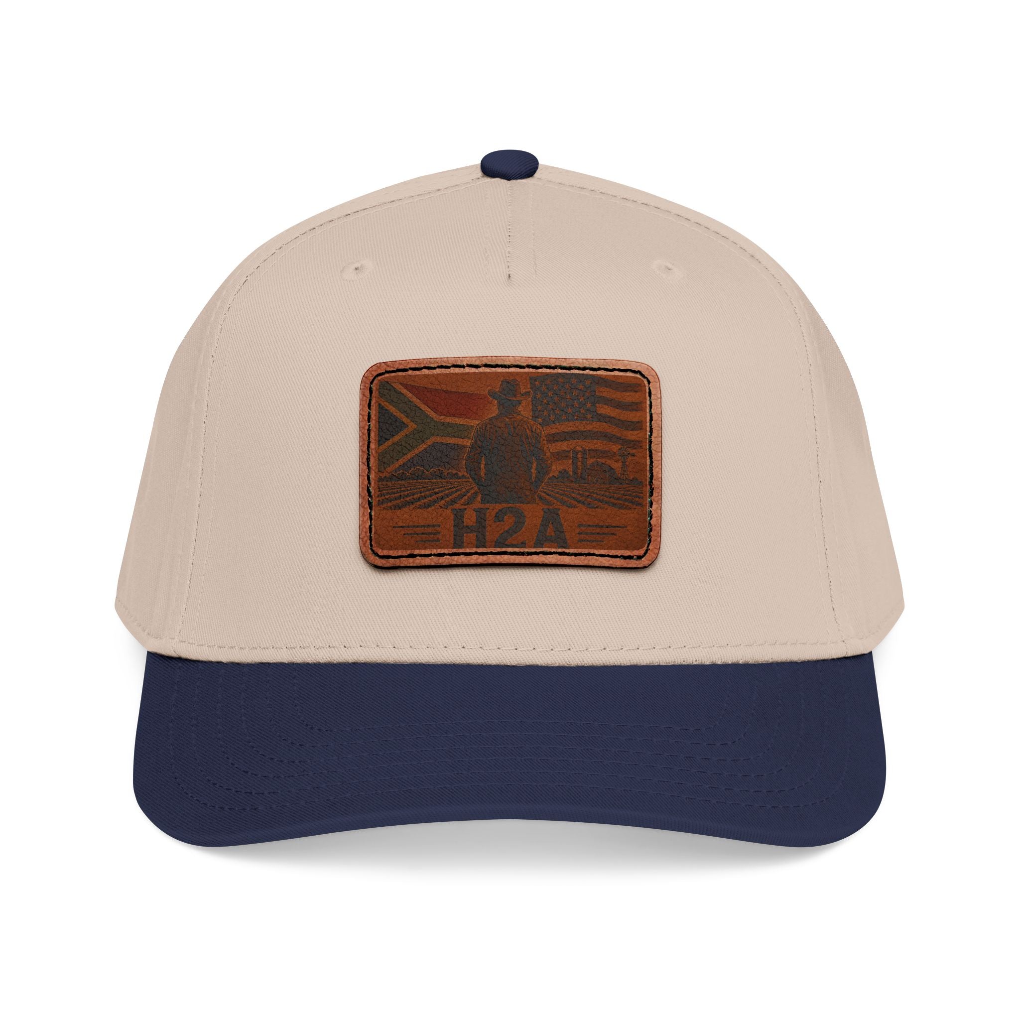 Leather patch baseball cap in cream with dark navy brim and rectangular H2A logo patch