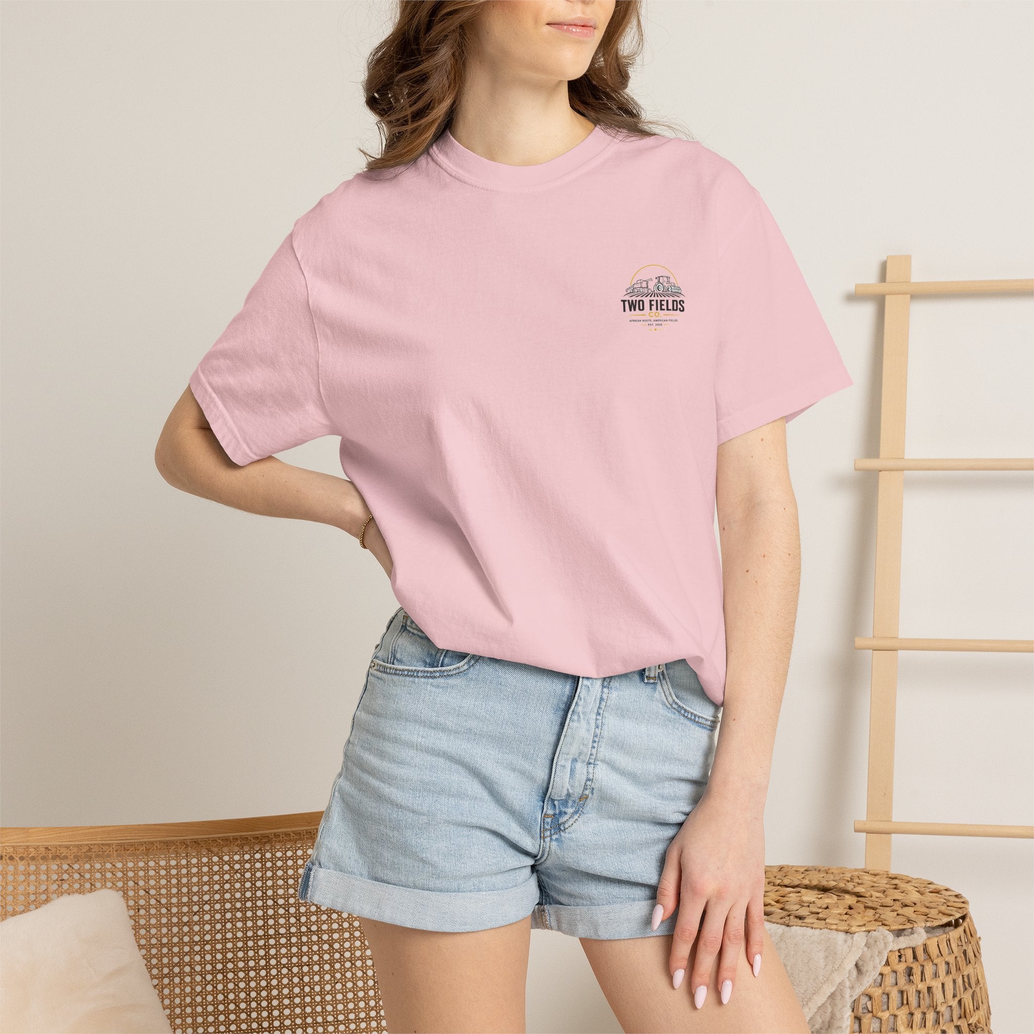 Light pink crew-neck T-shirt with small Two Fields Co. chest logo