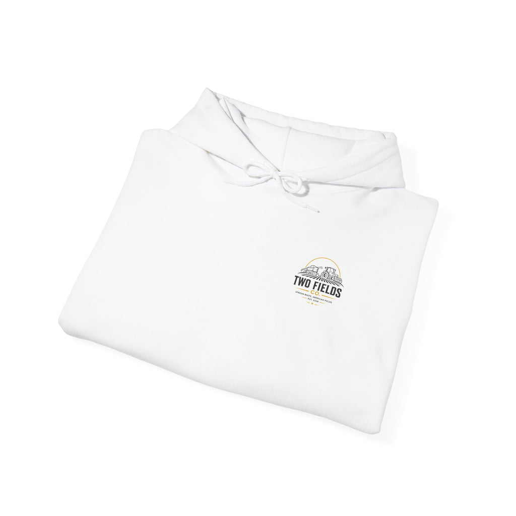 White hoodie laid flat, showing hood drawstring and small chest graphic