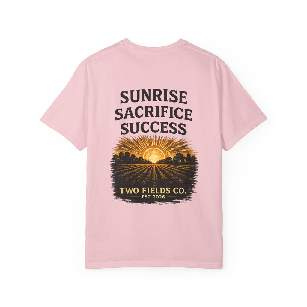 Pink T-shirt with Sunrise Sacrifice Success sunrise graphic and Two Fields Co badge