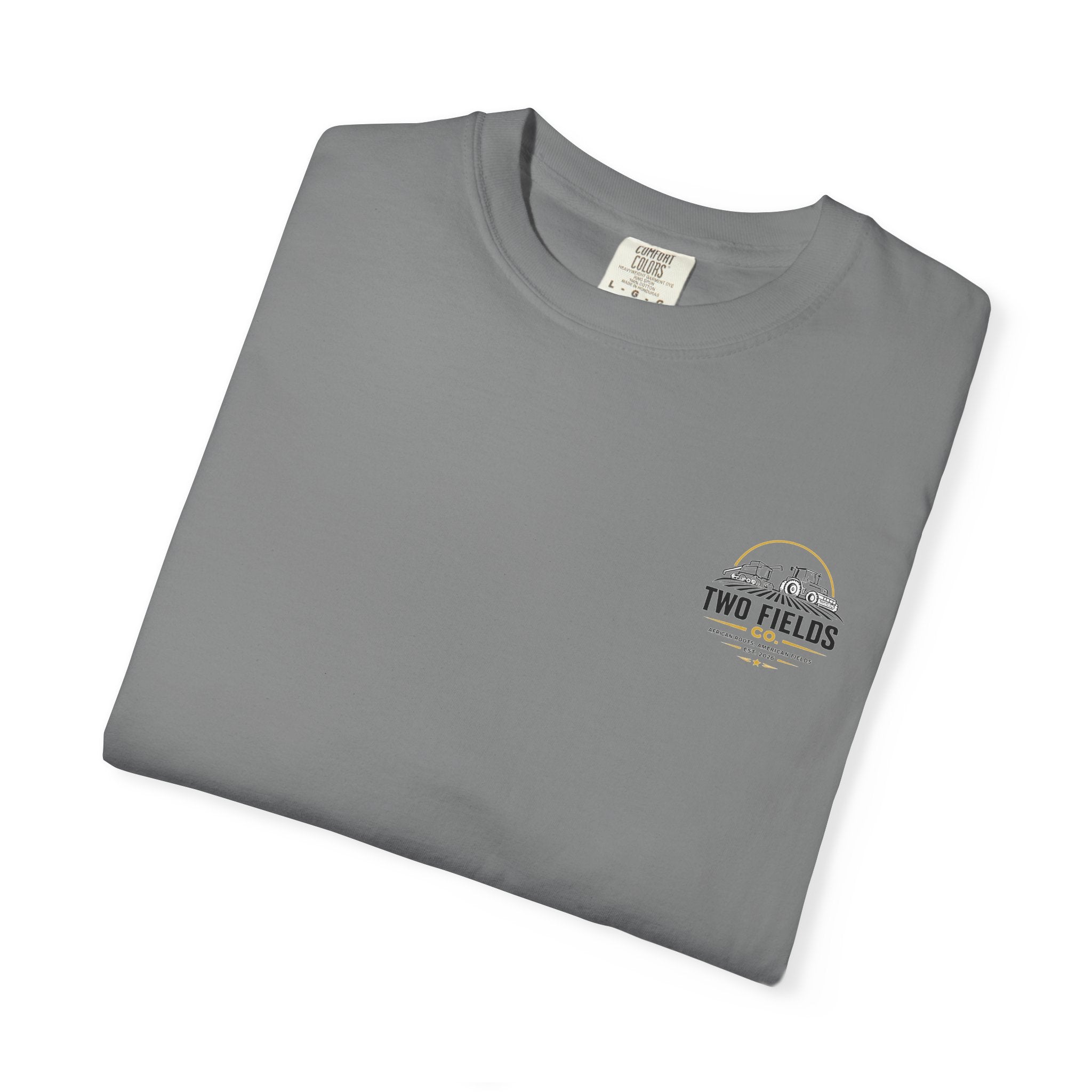 Grey crewneck graphic T-shirt folded, featuring small Two Fields Co. logo on chest.