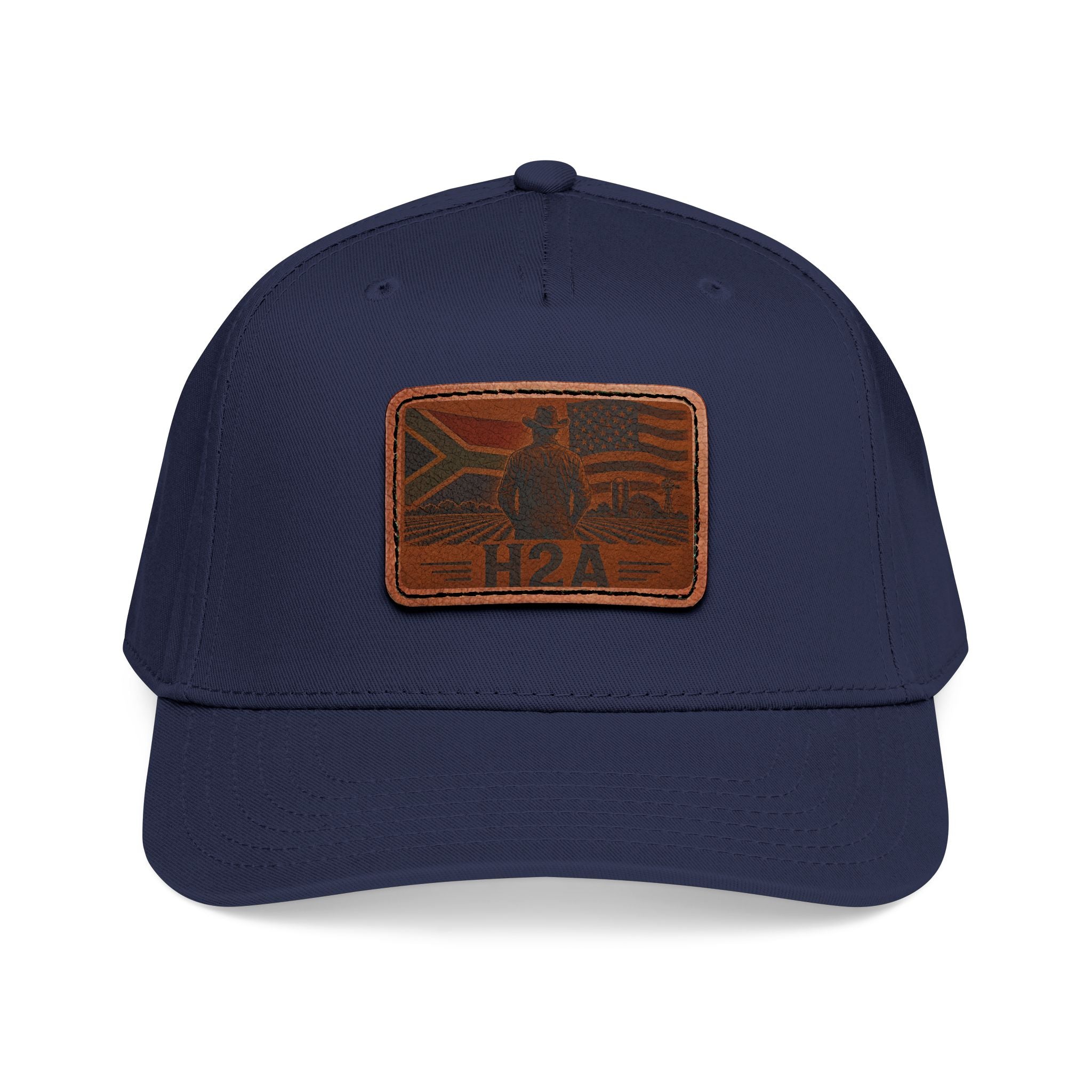 Baseball cap with navy fabric, and rectangular H2A leather patch on the front.