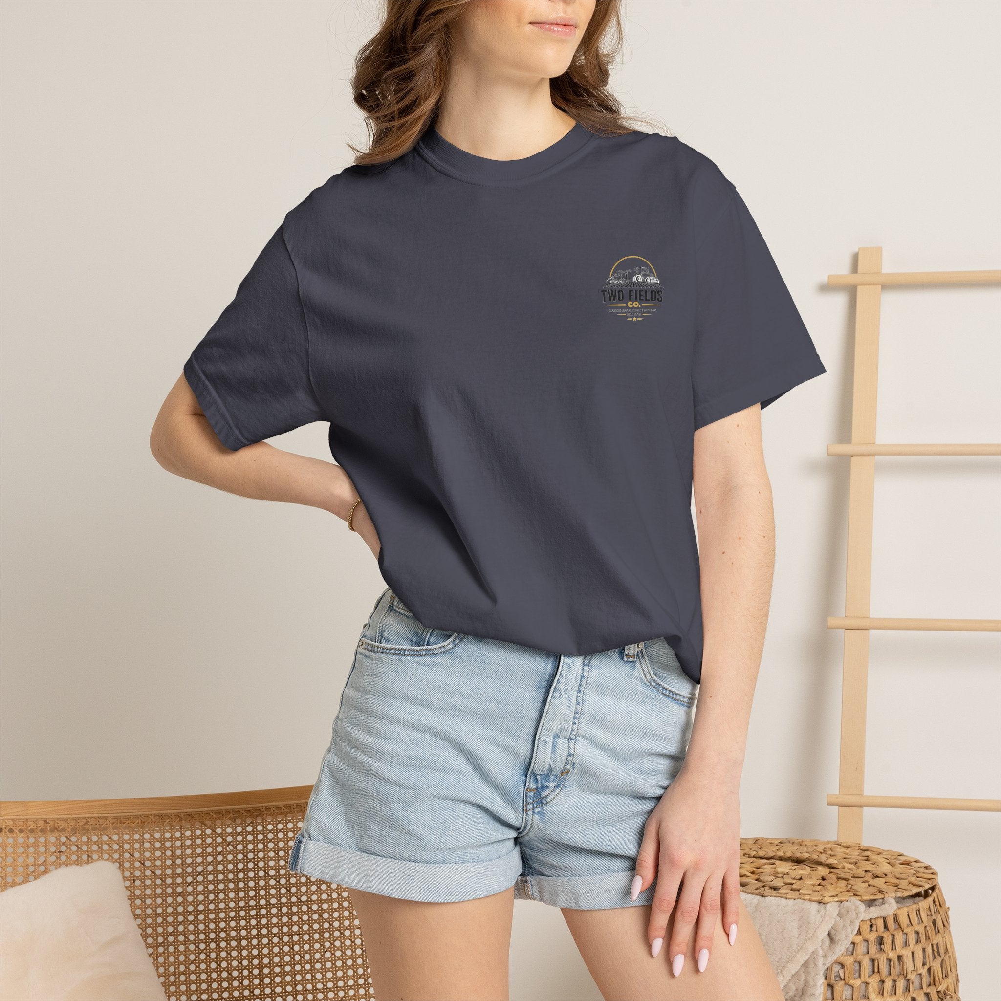 Dark short-sleeve T-shirt with small Two Fields logo on the chest