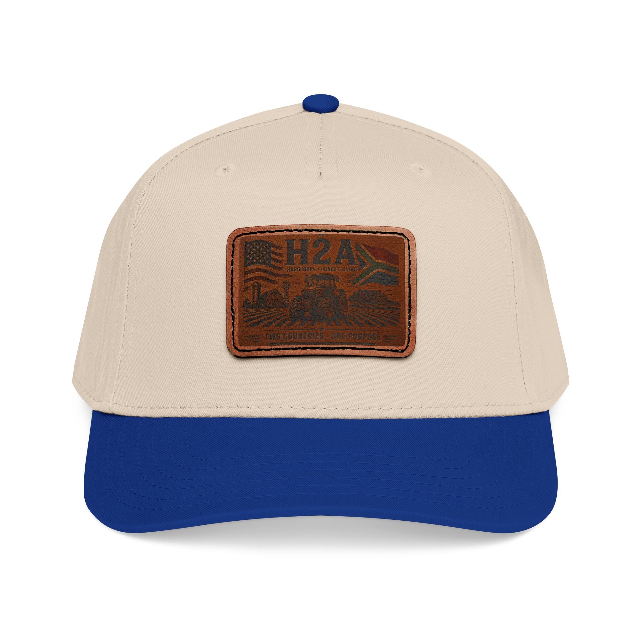 Two-tone baseball cap with rectangular H2A patch, cream crown and blue brim.