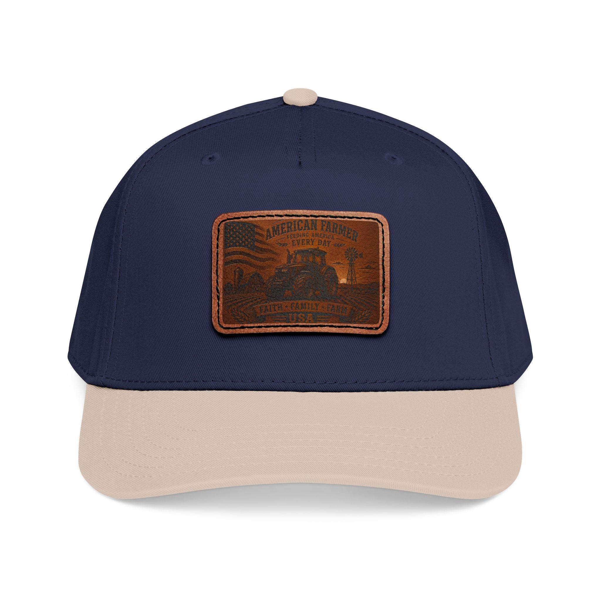 Two-tone baseball cap in dark navy with light brown brim and leather patch