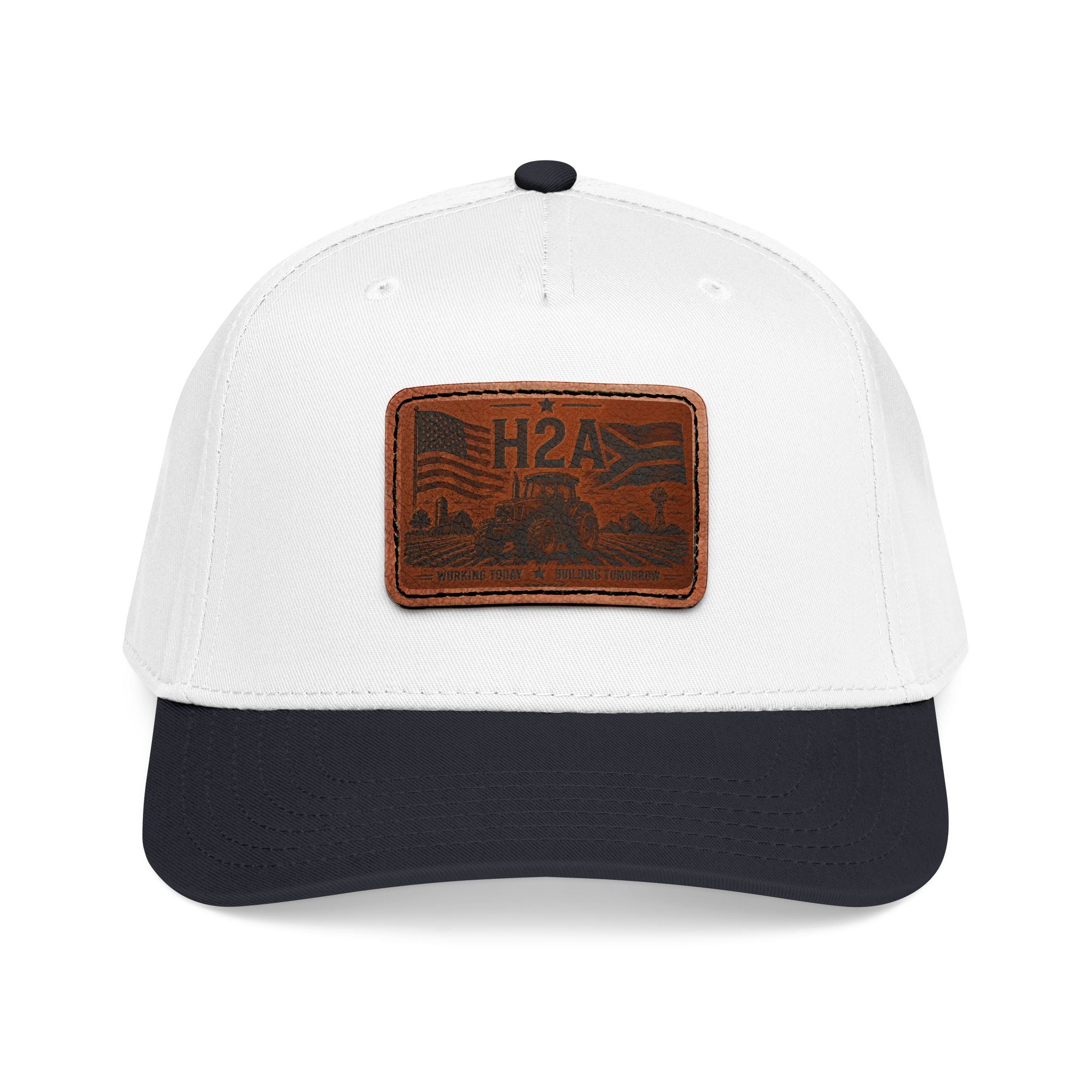 White trucker baseball cap with dark navy brim and brown leather-look H2A patch.