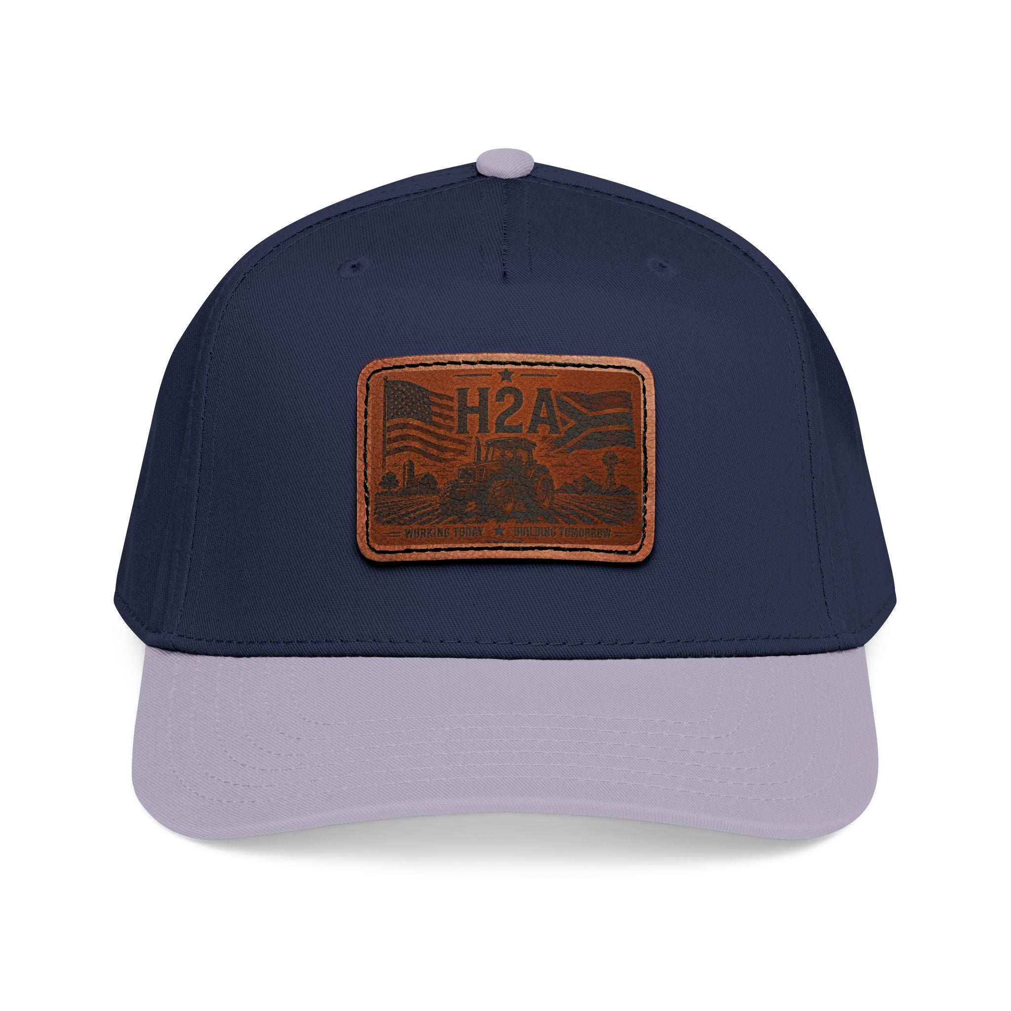 Two-tone baseball cap with rectangle H2A leather patch; navy crown and light gray brim.